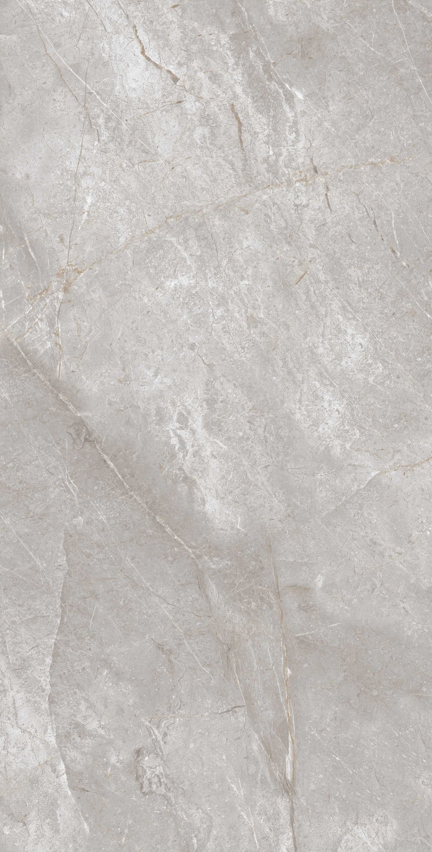 Pilka, su tamsiais ir šviesiais raštais, oliruotos akmens masės plytelė, atsparios tiek karščiui, tiek šalčiui, tinka vidaus ir lauko naudojimui.