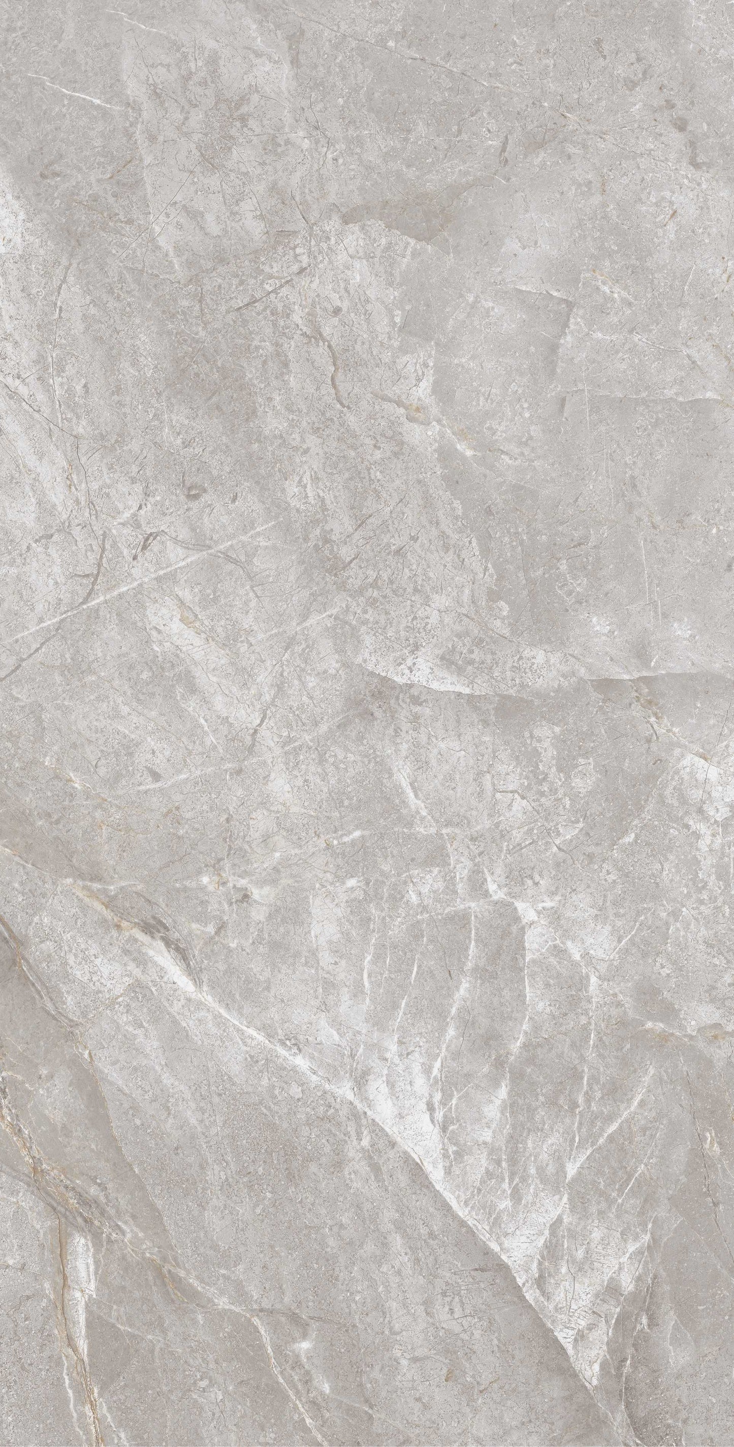 Pilka, su tamsiais ir šviesiais raštais, oliruotos akmens masės plytelė, atsparios tiek karščiui, tiek šalčiui, tinka vidaus ir lauko naudojimui.