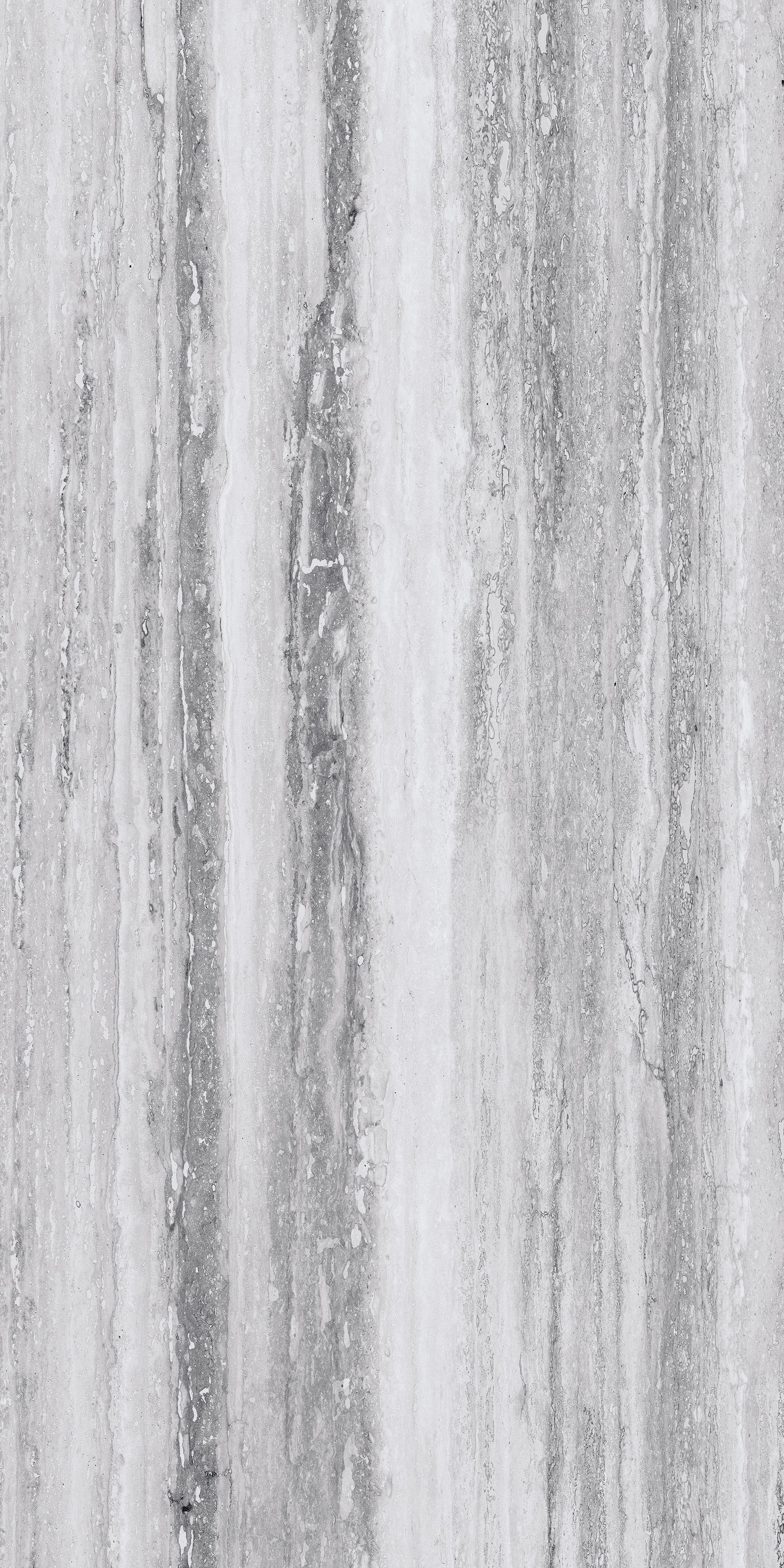 Pilkos, matinės akmens masės plytelės, pritaikytos vidaus ir lauko grindims.